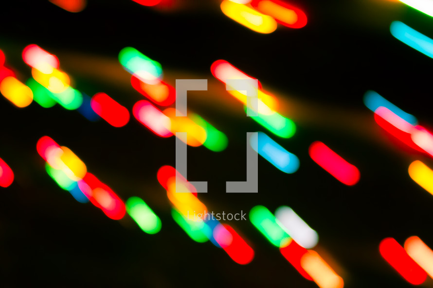 colorful bokeh lights against black 