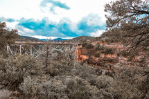 bridge in a red rock canyon landscape  