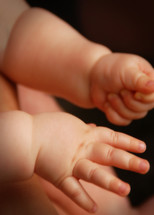 An infant's hands.
