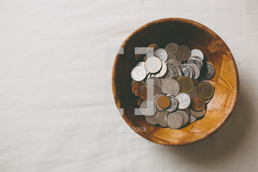 bowl full of coins 