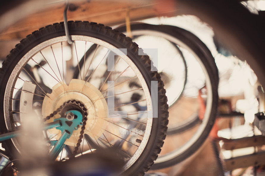 Suspended bicycle wheels.