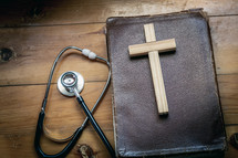 wooden cross on a Bible 