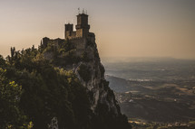 castle fortress on a mountain peak 