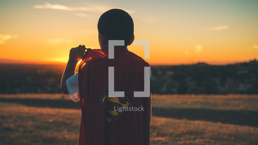 Boy facing the sun wearing a superman cape.
Imagination | Dreaming | Destiny | Vision| Heroes | Justice | Kids Ministry | Movies | Heroes | Bravery | Brave | Courage | Courageous | Strong | Strength | Stand | Determination | Persevere | Sermon Series |

