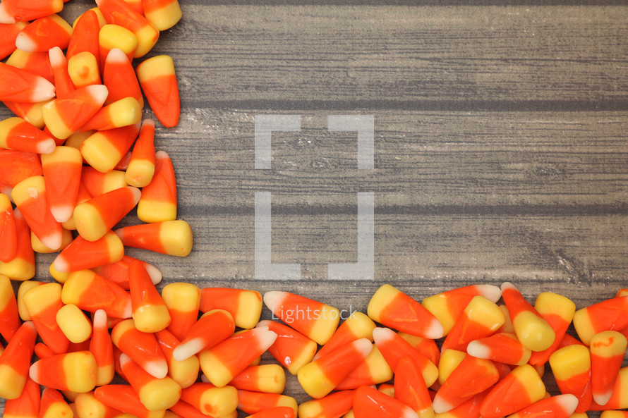 candy corn on a wood background 