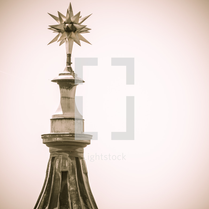 star at the top of a steeple 