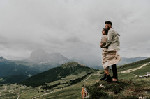 engagement portrait on the side of a mountain 