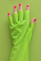 rubber glove with red nail polish 