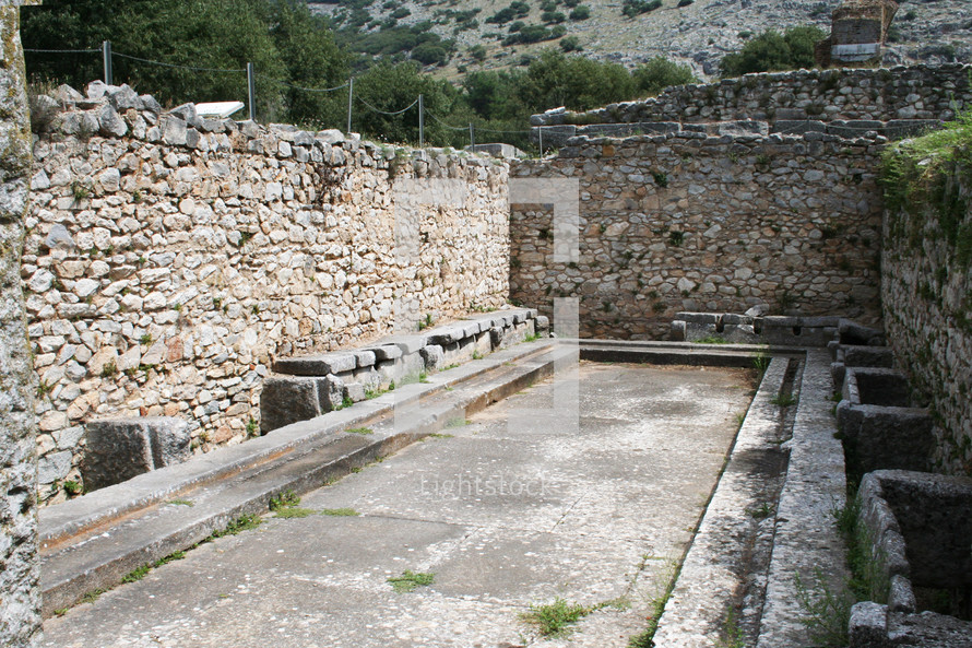 These are the public toilets at the ruins from Ancient Philippi. These toilets date to the 3rd century AD. Philippi was the home of Lydia the merchant who befriended the Apostle Paul in Acts 16 of the Bible. 

