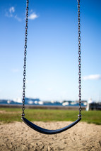 Swing with chains ropes.