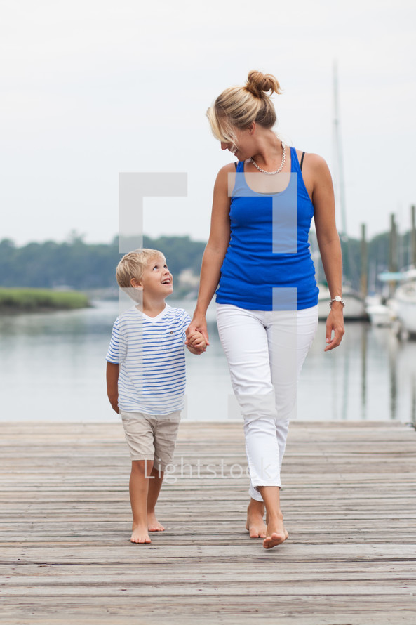 mother and son on a dock 
