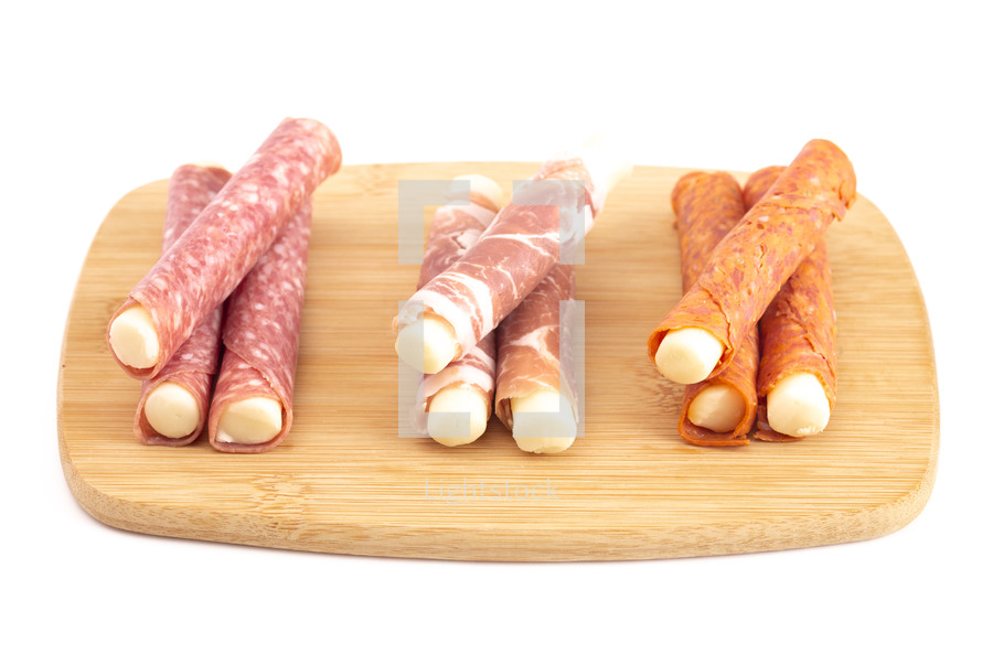 mozzarella cheese sticks wrapped in cured meat 