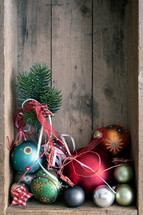 Christmas ornaments in a wooden crate 
