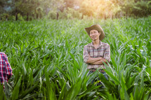 a farmer in a corn field 