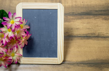 pink and white flowers and chalkboard 