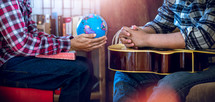 Two young christian share bible and worship music to worship God