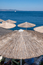 straw beach umbrellas 