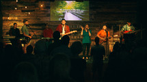 musicians on stage during a worship service 
