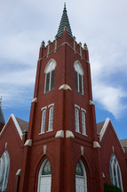 exterior of a brick church 