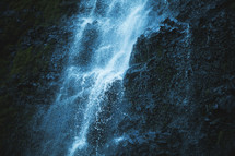 waterfall on the side of a cliff 