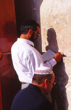 Jewish man praying on the wailing wall 