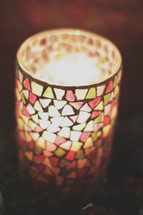 A stain glass candle light centerpiece 