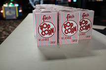 boxes of popcorn at an arcade 
