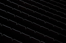 Rows of auditoruim chairs.