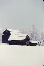 barn in winter snow 