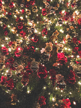 Christmas lights and ornaments on a Christmas tree 