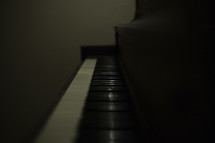 piano keys in a dark room 