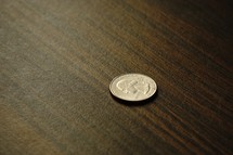quarter on a table 