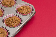Apple Cinnamon Pecan Muffins in a Tin with Copy Space