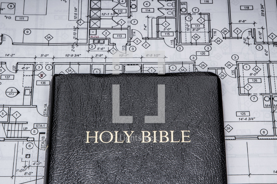 blueprints and a Bible 