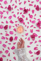Conceptual Woman Hand, Rose Wine With Roses and Petals