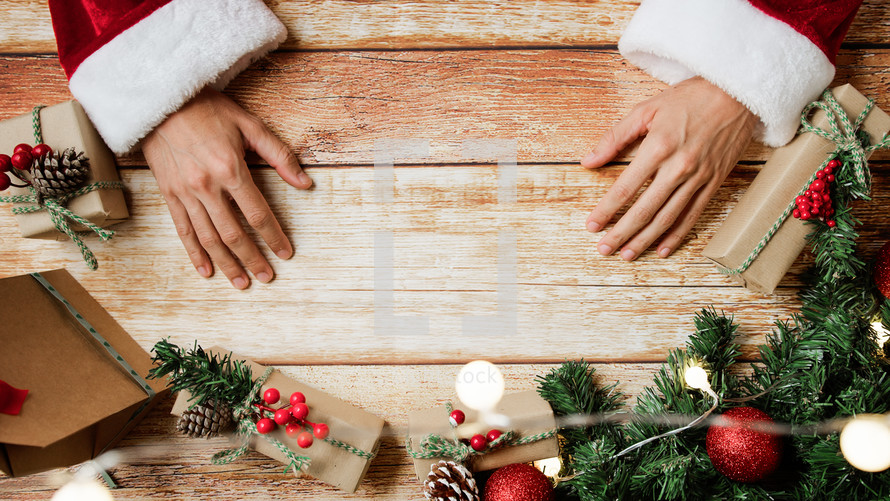 Christmas Background with Santa Claus Hands