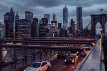 cars crossing Brooklyn Bridge 