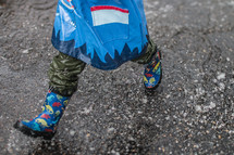 a child in rain boots 