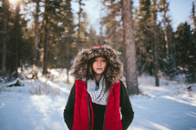 woman, winter, snow, standing, red vest, vest, hood, scarf