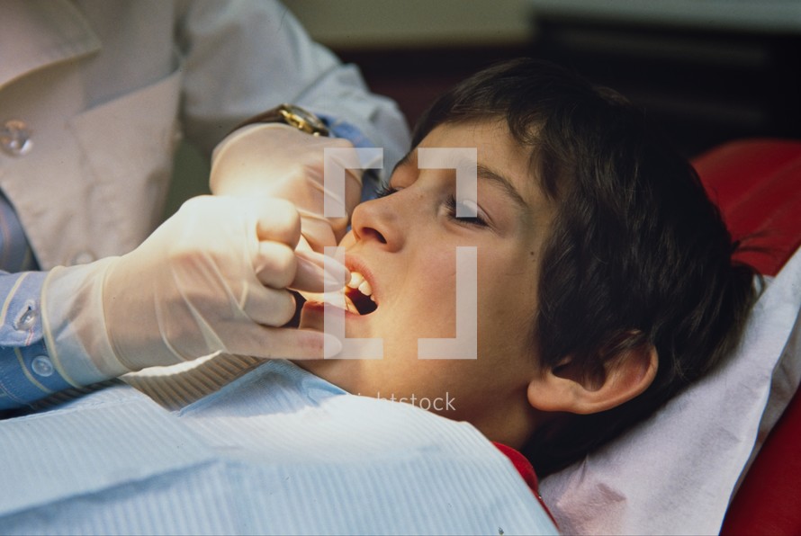 a boy child at the dentist 
