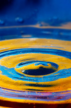 Close-up view on blue and yellow aquarelle paint like Ukrainian flag