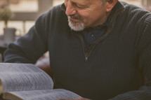 A man reading a Bible 