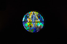 circular stained glass window of Jesus 