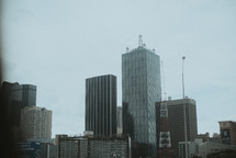 city skyscrapers in fog 