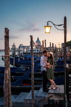 a couple kissing in Venice 