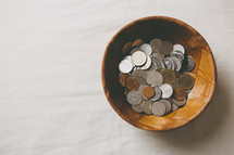 bowl full of coins 
