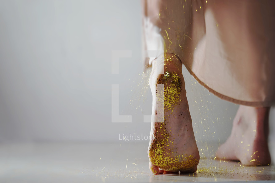 woman with glitter on her feet 