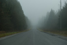 fog over a rural road 