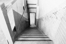 An old steep, narrow stairway.