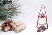 presents under a Christmas tree and red lantern